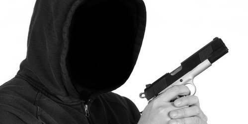 black hoodie with gun