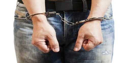 man handcuffs crime arrest