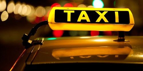 taxi cab sign night